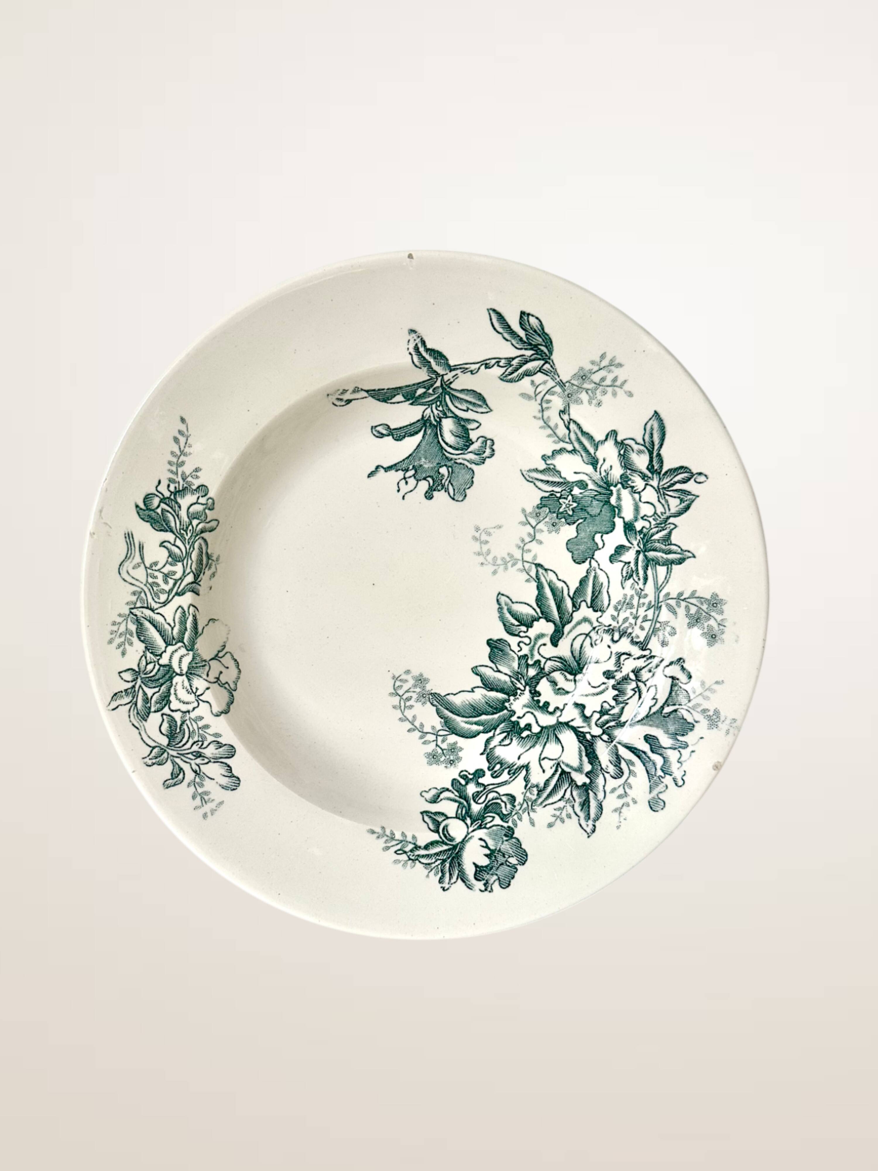 Set of nine deep plates in Givors earthenware, "Floreal" model.
