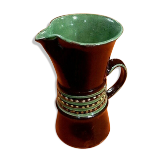 Glazed terracotta pitcher decorated with beaded friezes