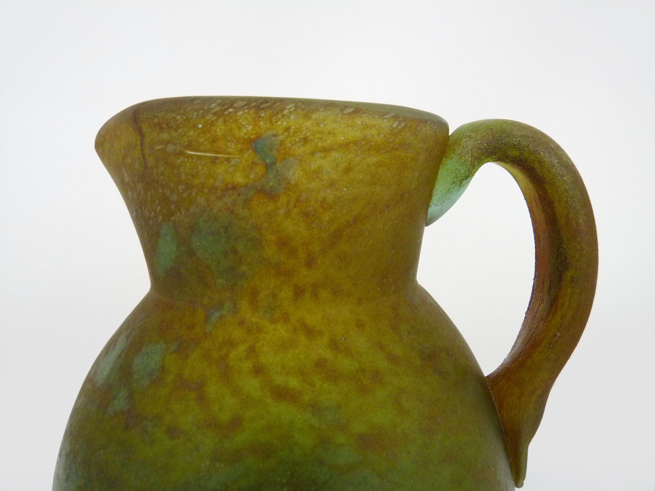 Pitcher in orange and green marble glass paste. Signed Georges De Feure for Daum