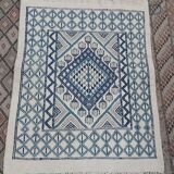 White carpets multicolored Berber patterns