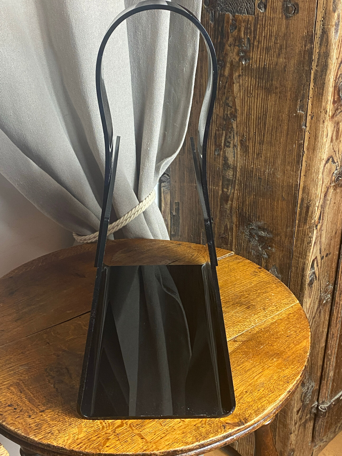 Black plexiglass magazine rack