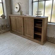 Large row of solid oak loom sliding doors