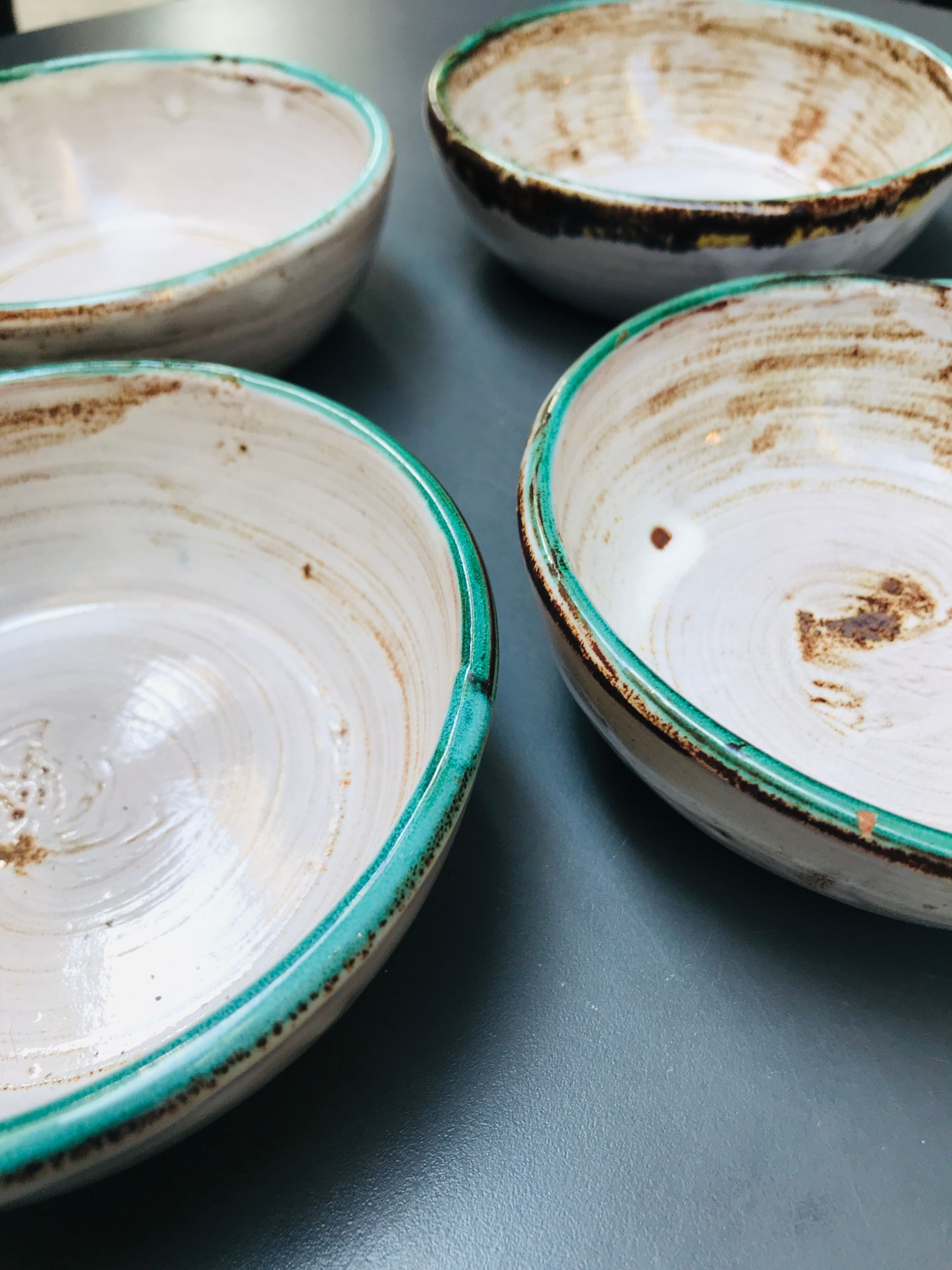 Set of 4 enamelled earth cups