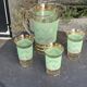 Serve an orangeade, a carafe and 3 glasses in green granite with golden trim.