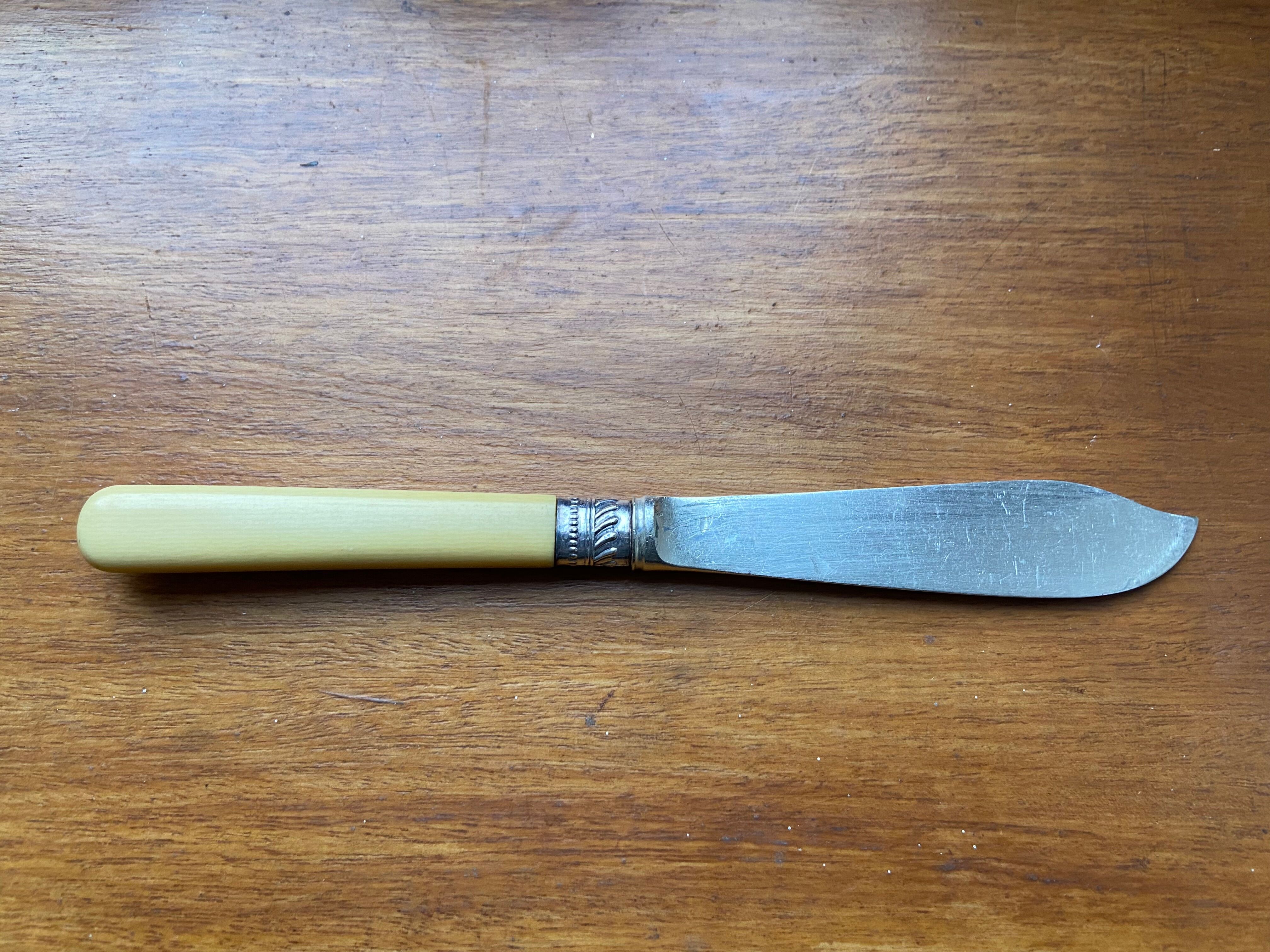 Antique silver-plated butter knife