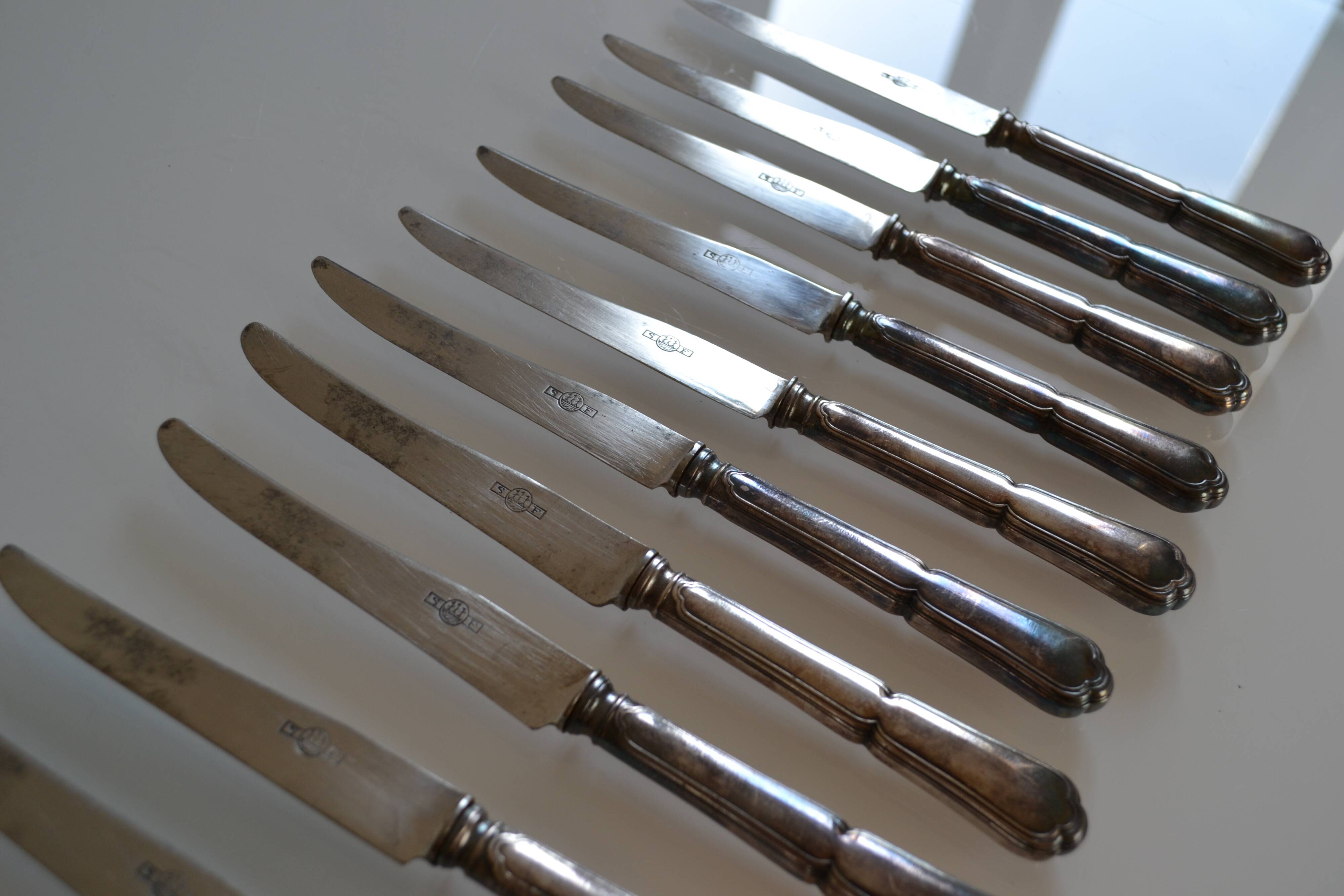 12 silver metal dessert or cheese knives