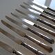12 silver metal dessert or cheese knives