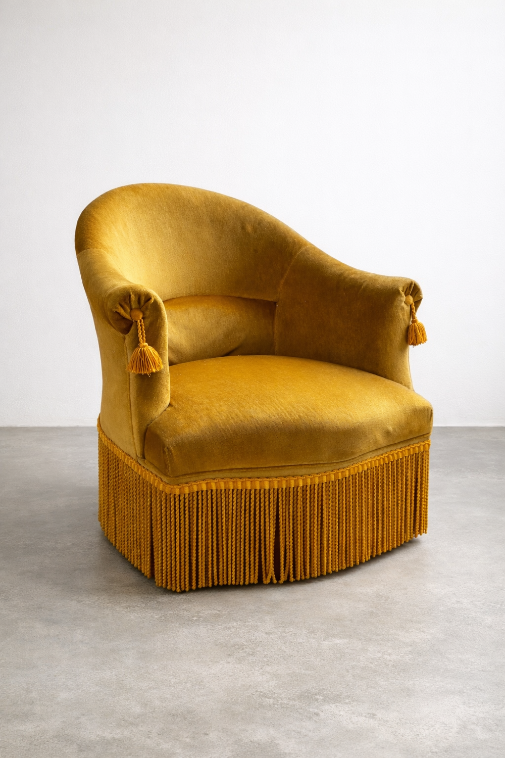 Mustard velvet armchair