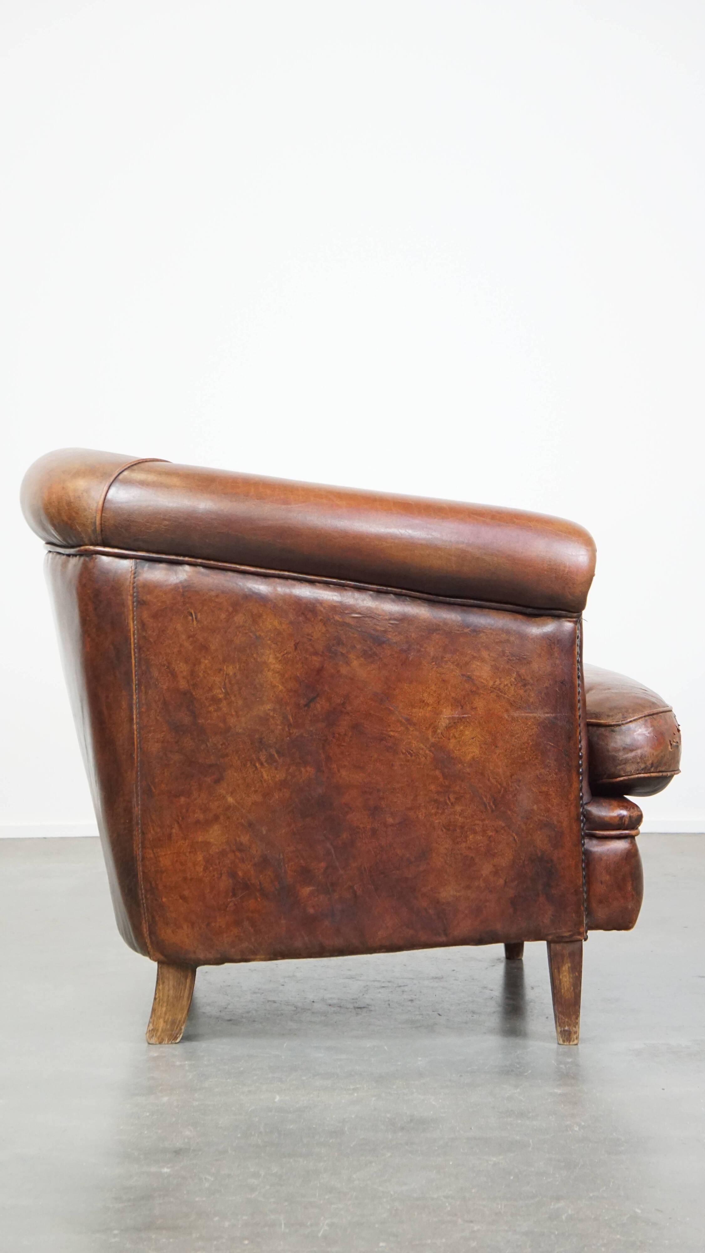 Cognac-colored sheepskin leather club chair