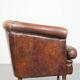 Cognac-colored sheepskin leather club chair