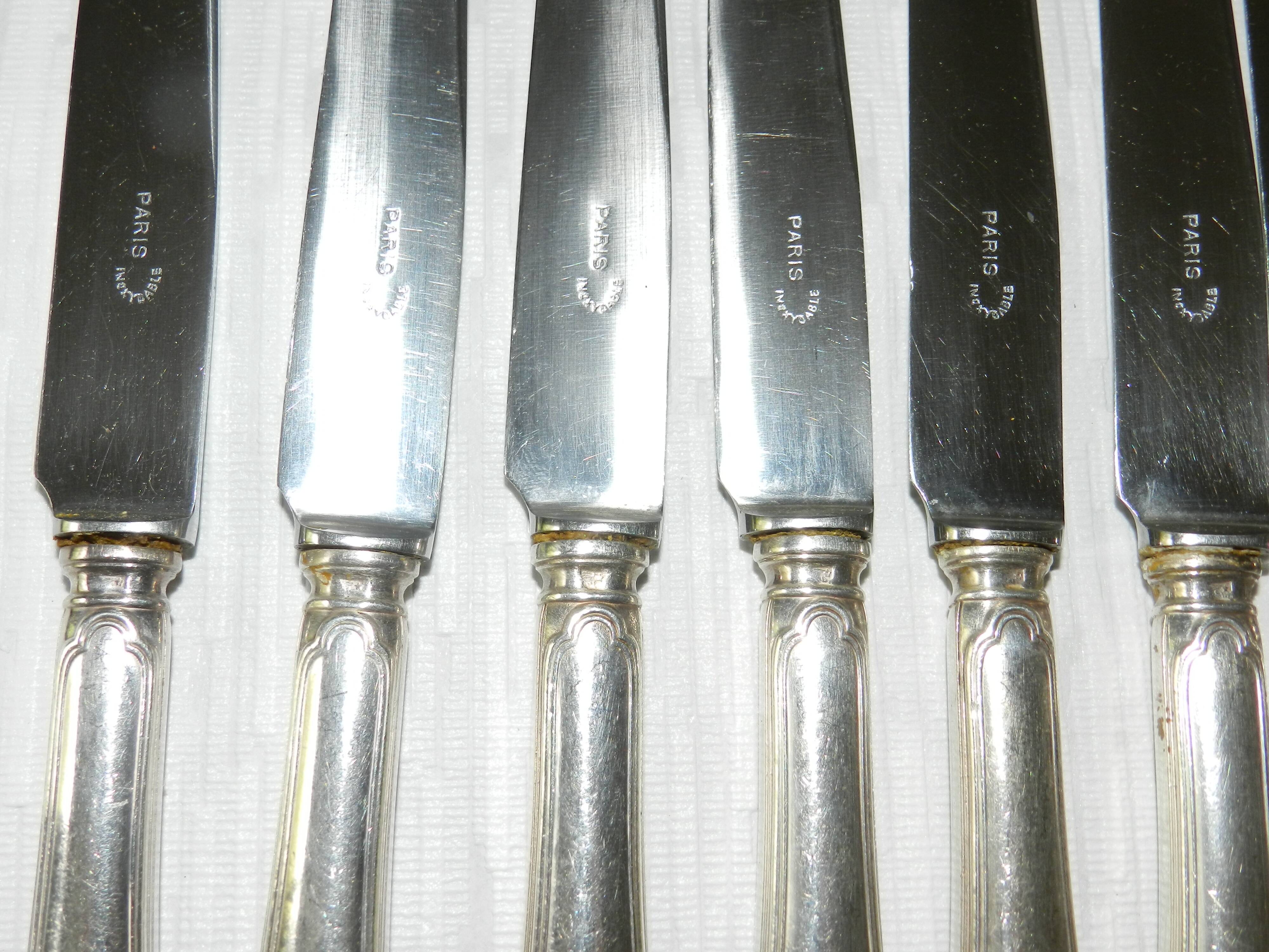 Set of 12 silver-plated metal knives