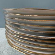 Series of 11 old flat plates in white porcelain and gold edging