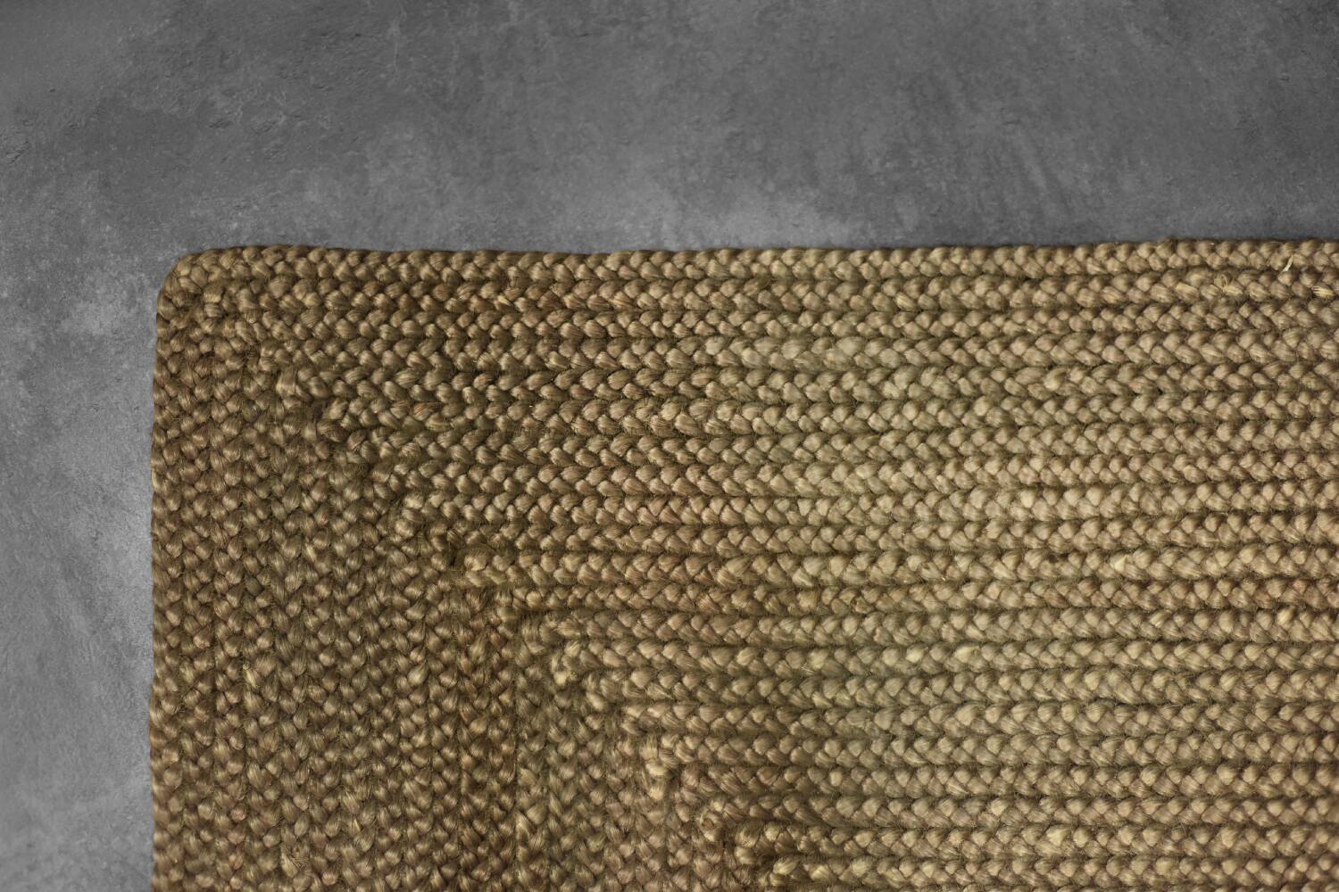 Brown flat-woven jute Indian rug, 1970.