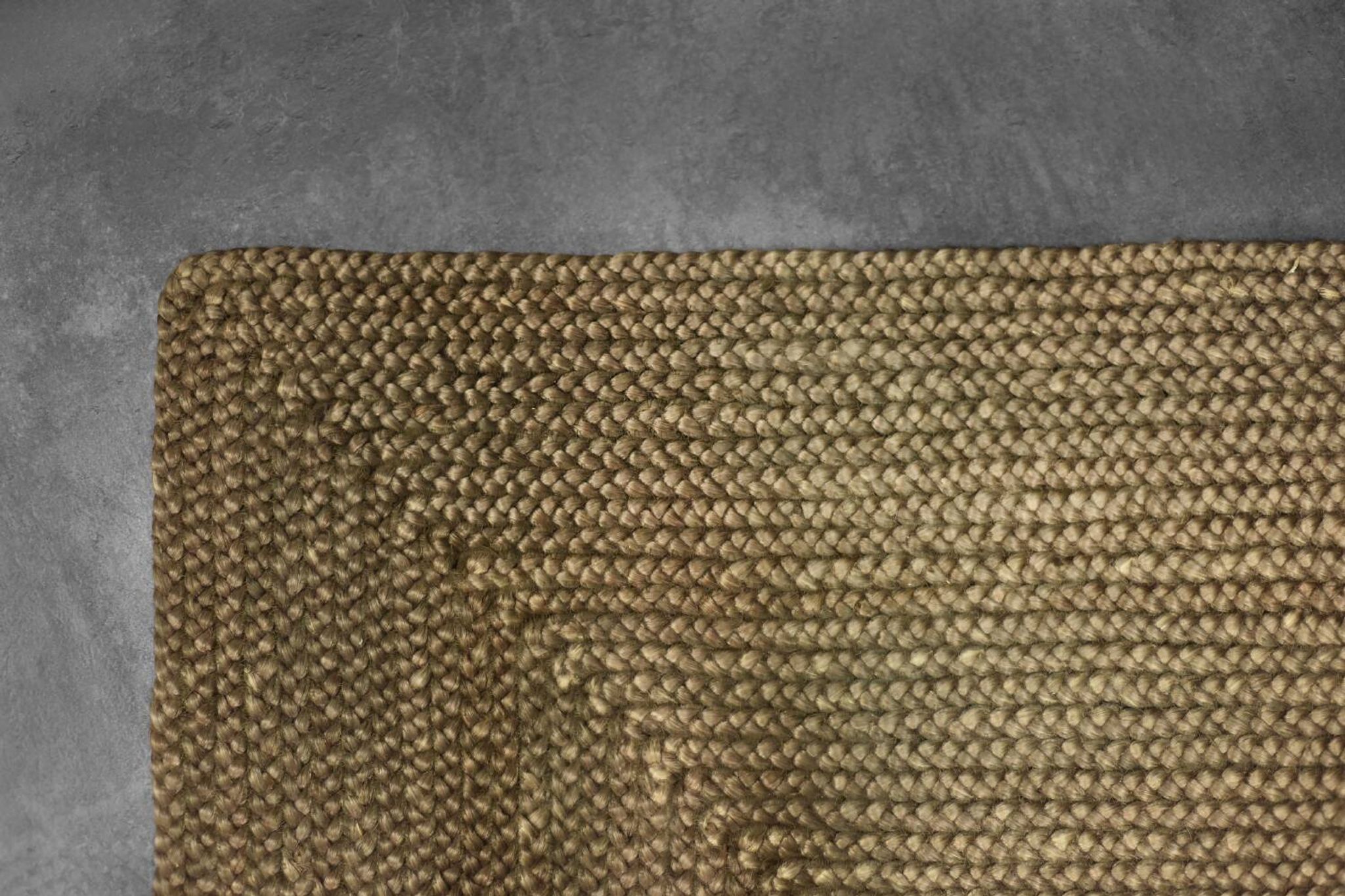 Brown flat-woven jute Indian rug, 1970.