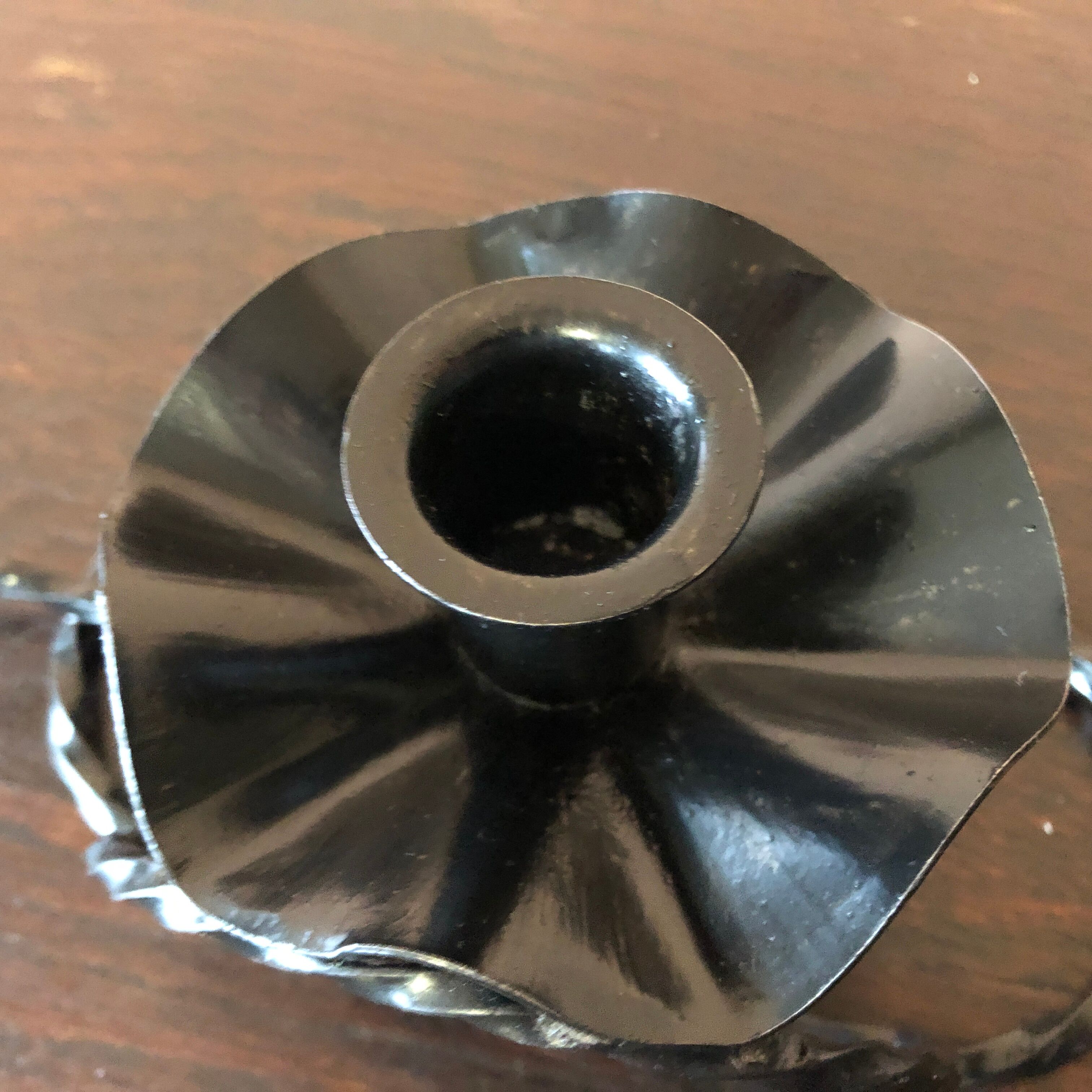 Handmade hand candle holder in vintage black wrought iron