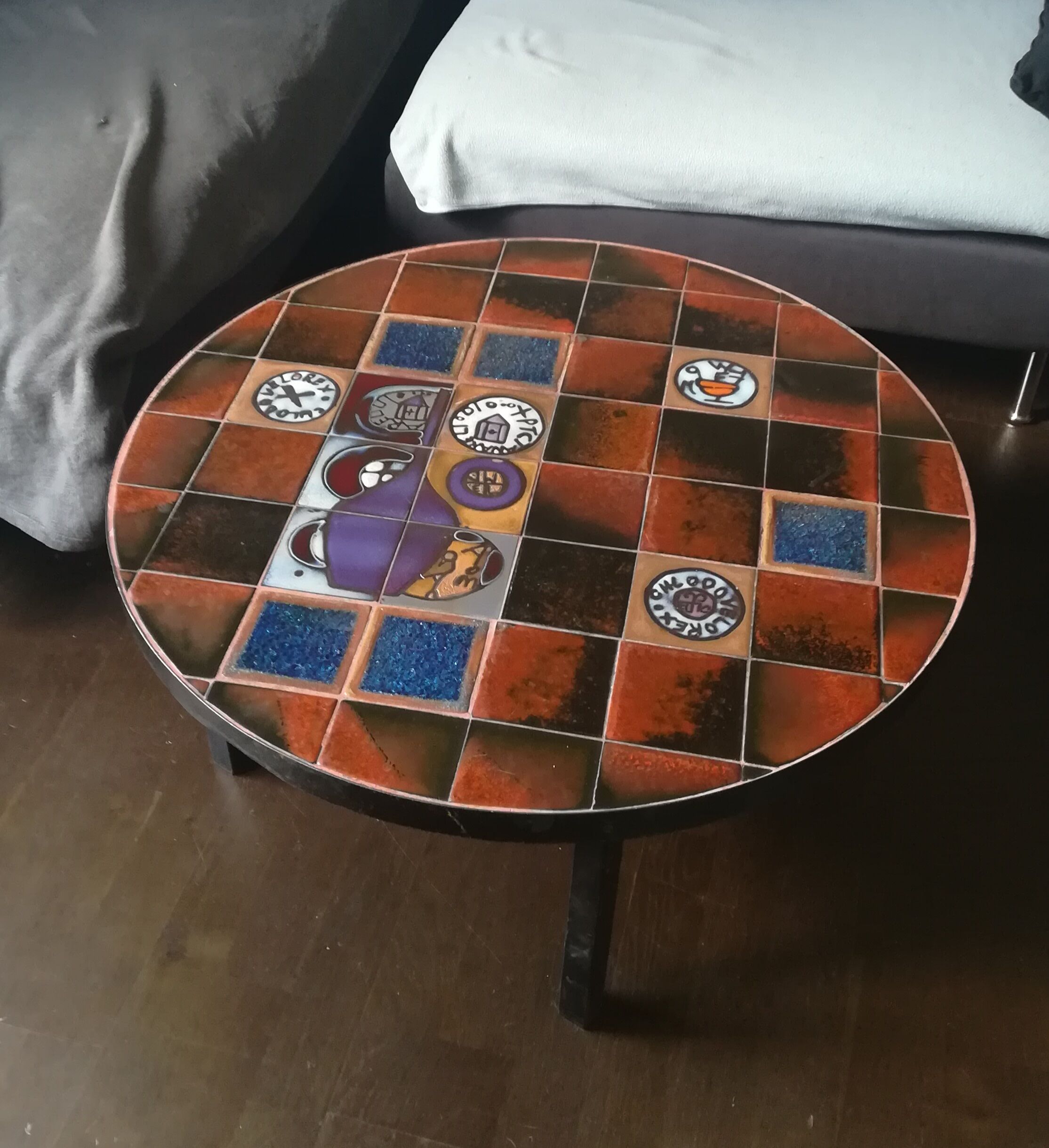 Coffee table, ceramic tray, metal feet, circa 1960