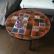 Coffee table, ceramic tray, metal feet, circa 1960
