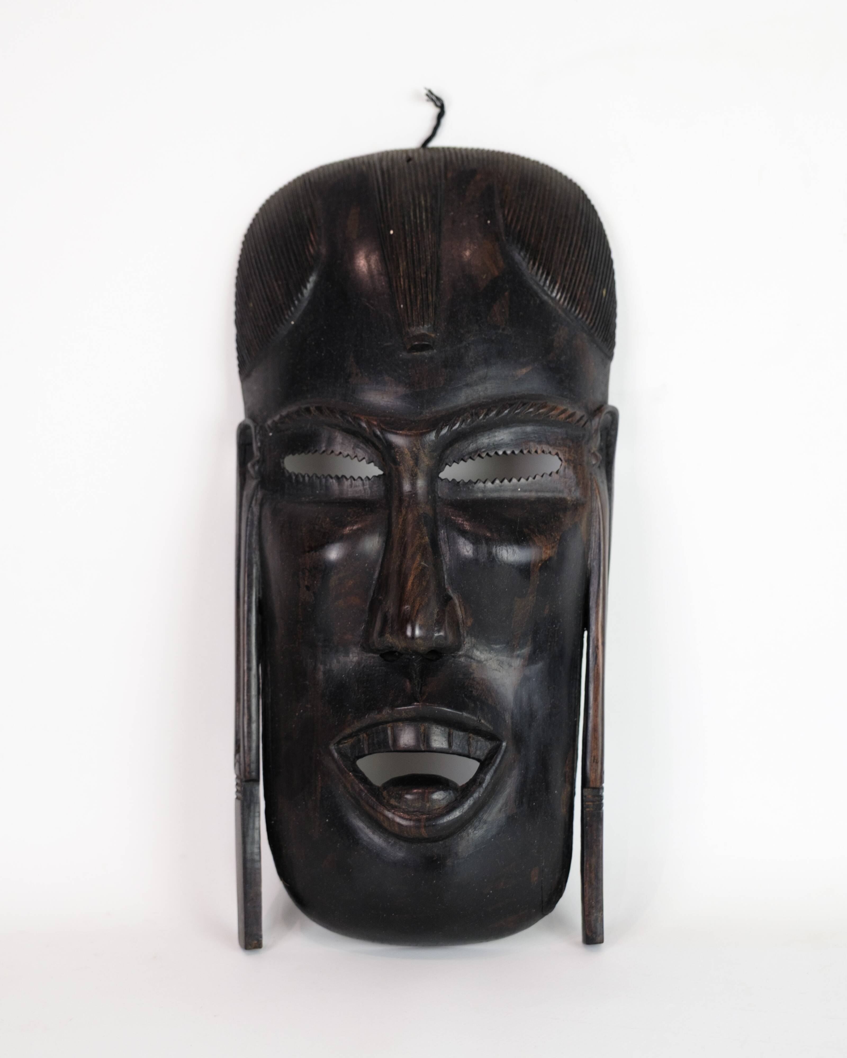 African Mask Hand Craved In Dark Wood From West Africa
