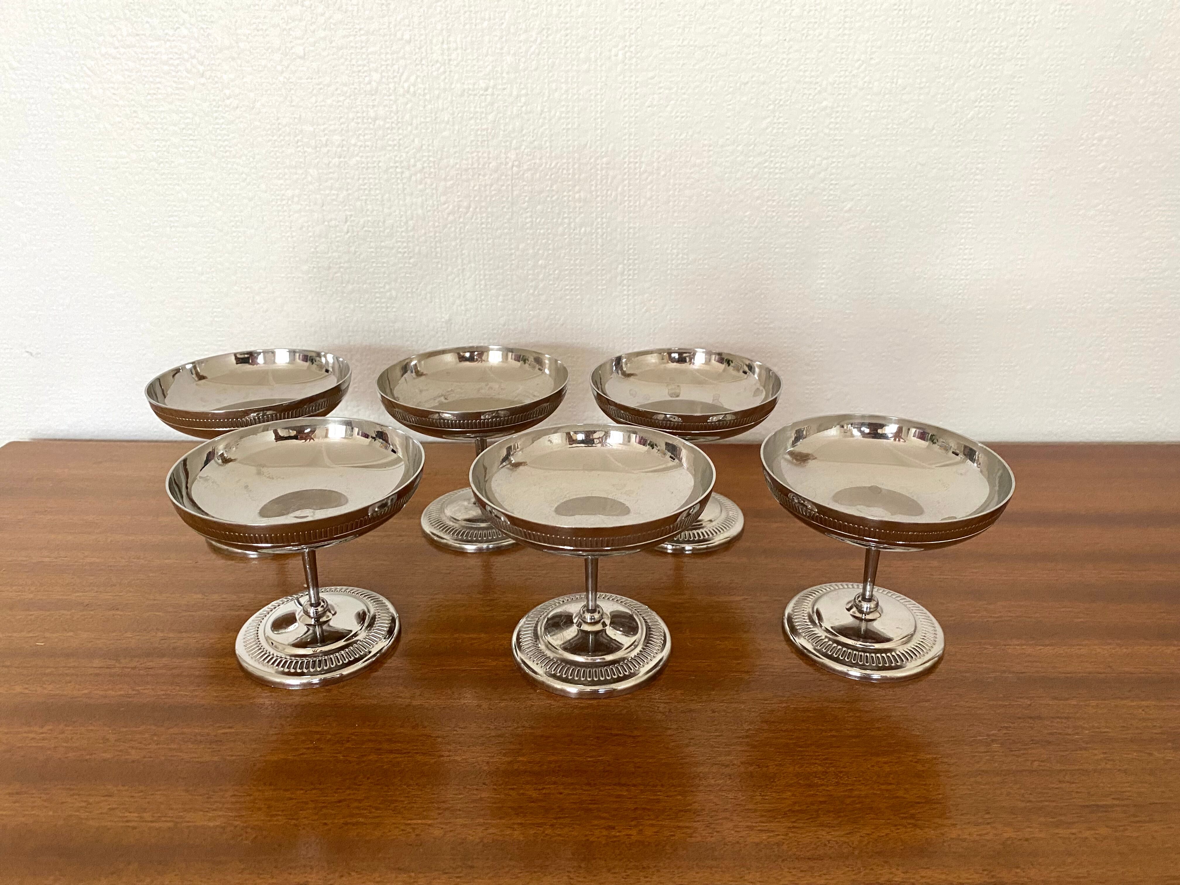 Old silver metal standing ice cups