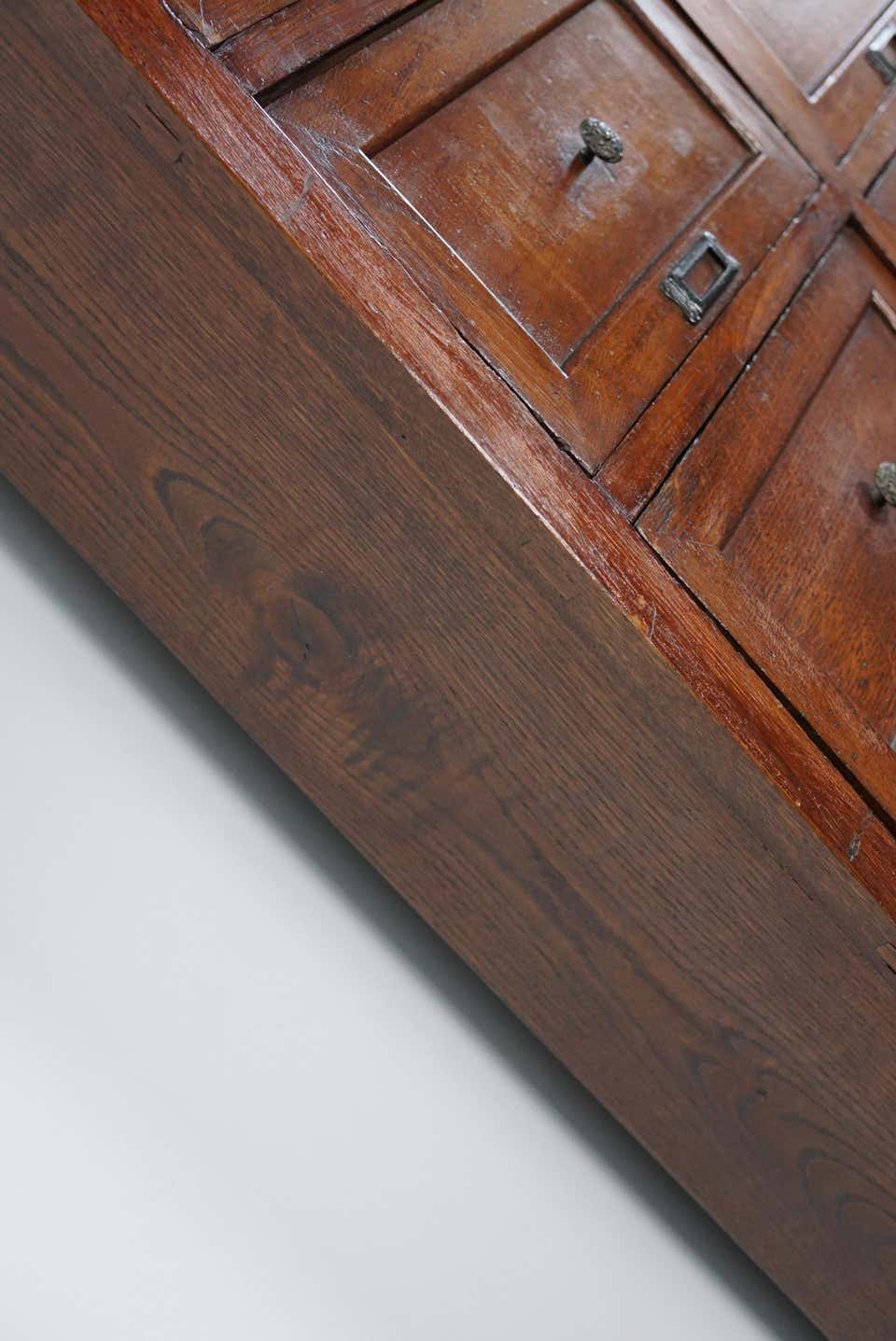 1870s oak apothecary cabinet