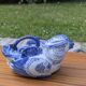 Old teapot / bird-shaped jug in blue and white porcelain
