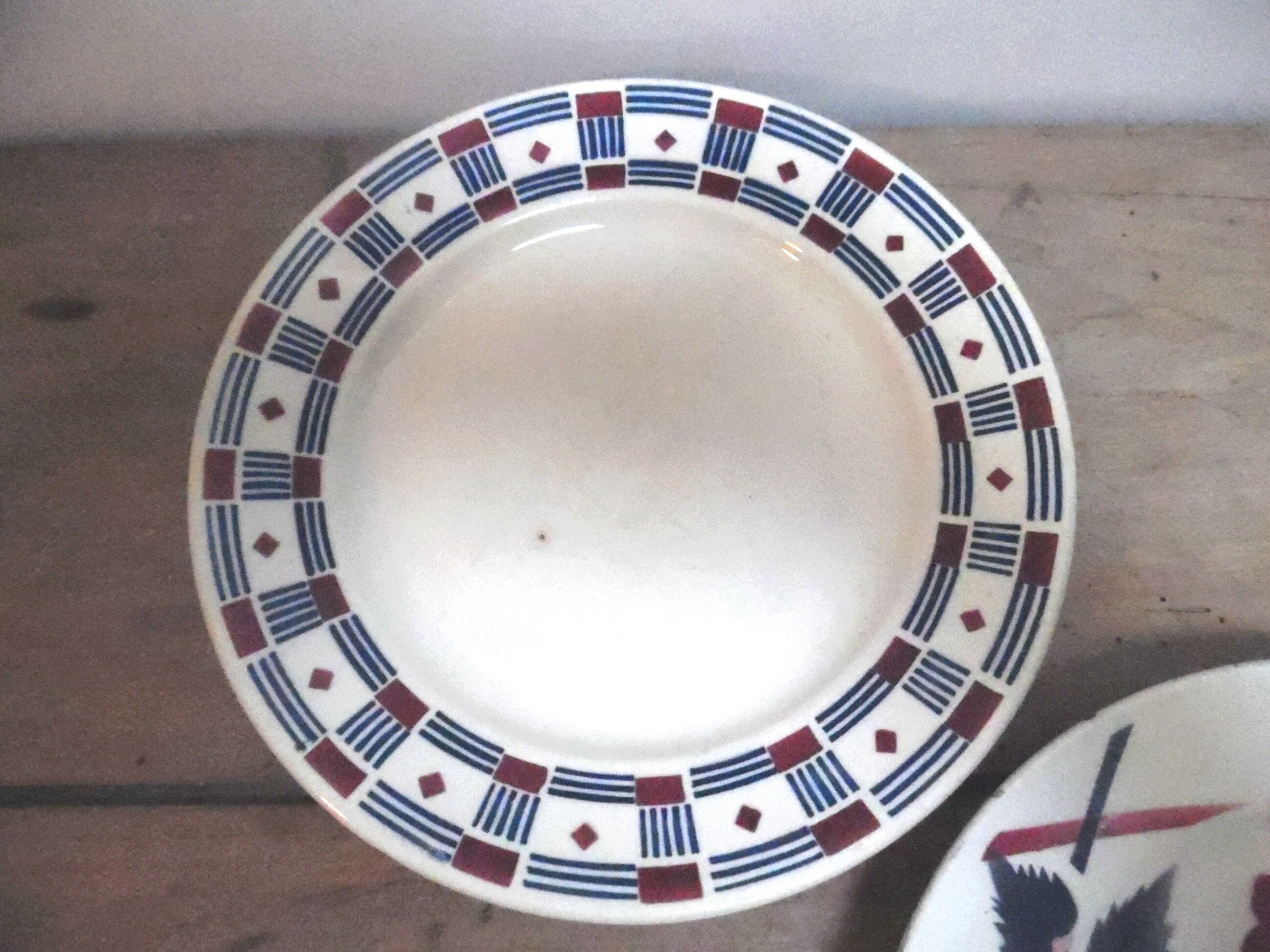 Six plates mismatched earthenware