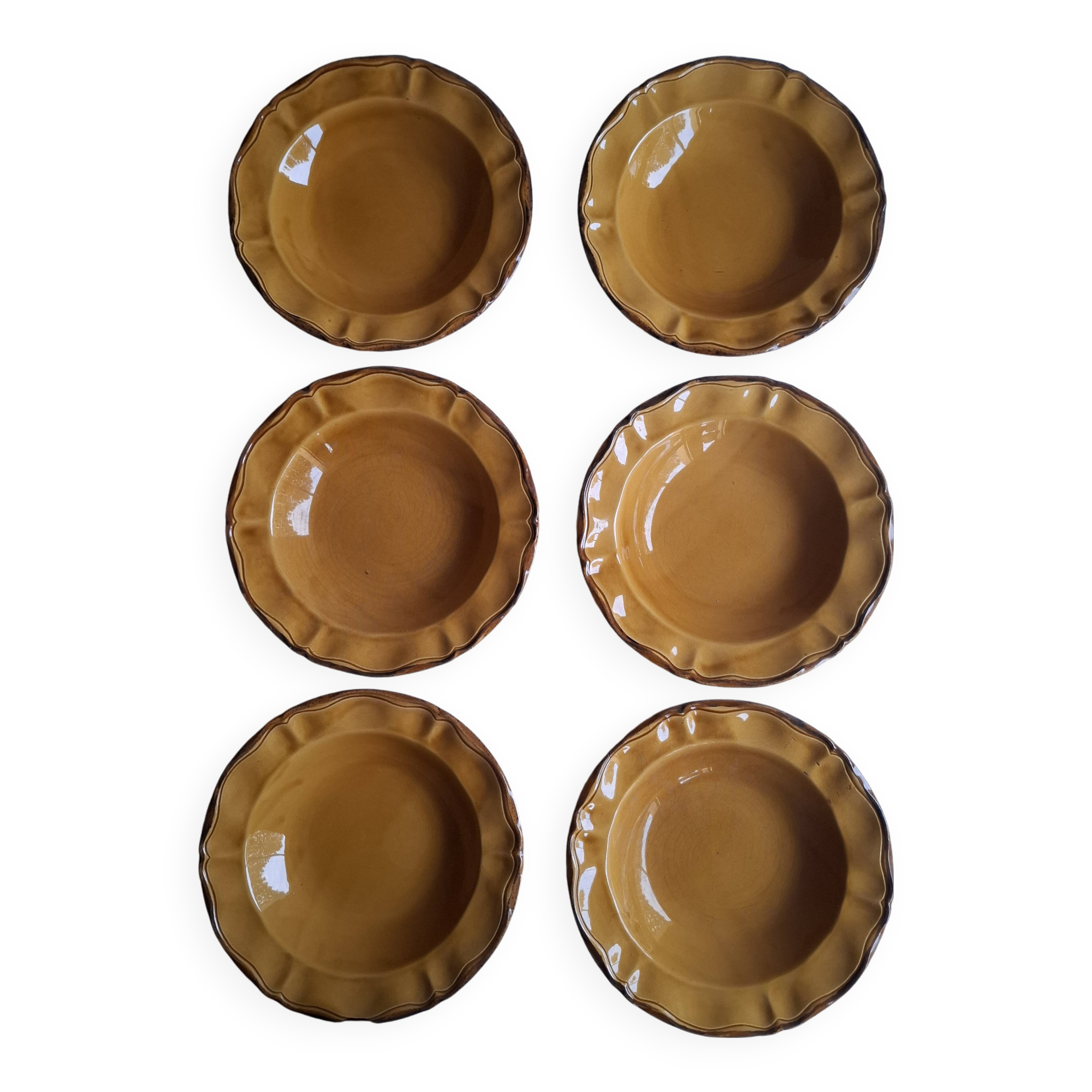 6 ochre deep plates from the Faïencerie de Haute Provence.