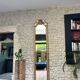 Antique mirror, 238.5/51cm, between two panes, with gilded pediments and gold leaf