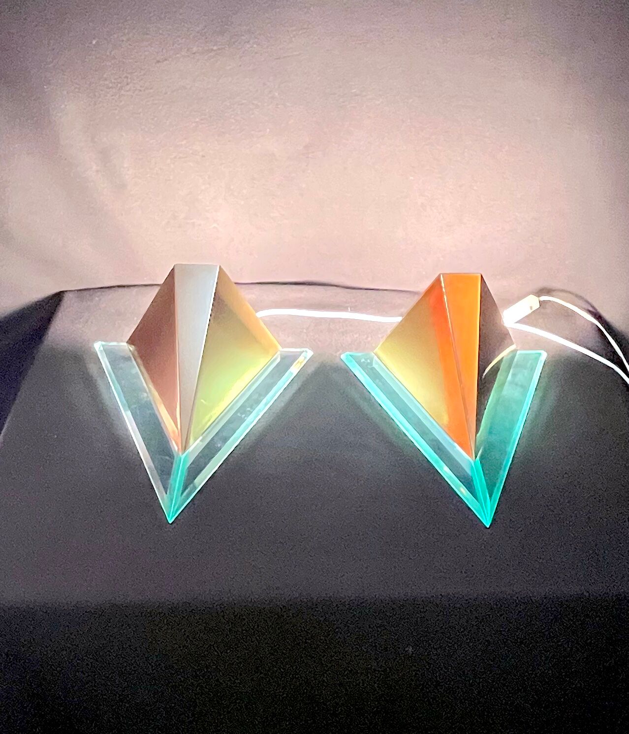 Pair of postmodern triangular sconces, gold metal and lucite, fin XX by Massive