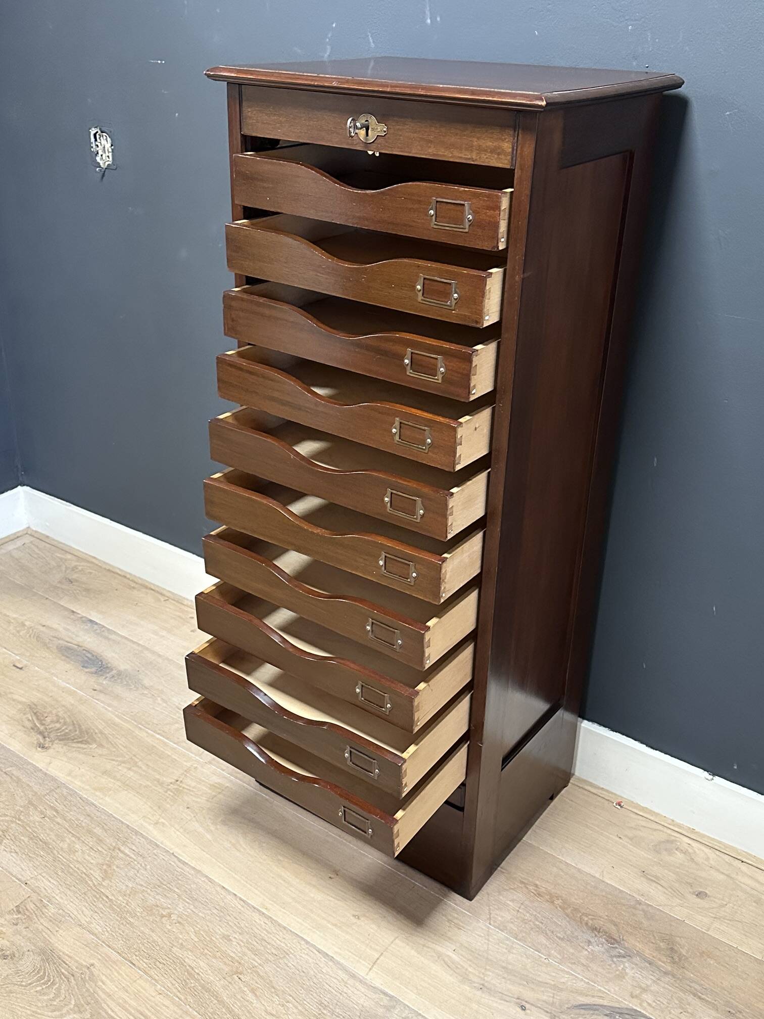 Antique mahogany roll-top filing cabinet with 10 drawers