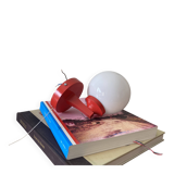Red plastic wall light with a white opaline glass globe.