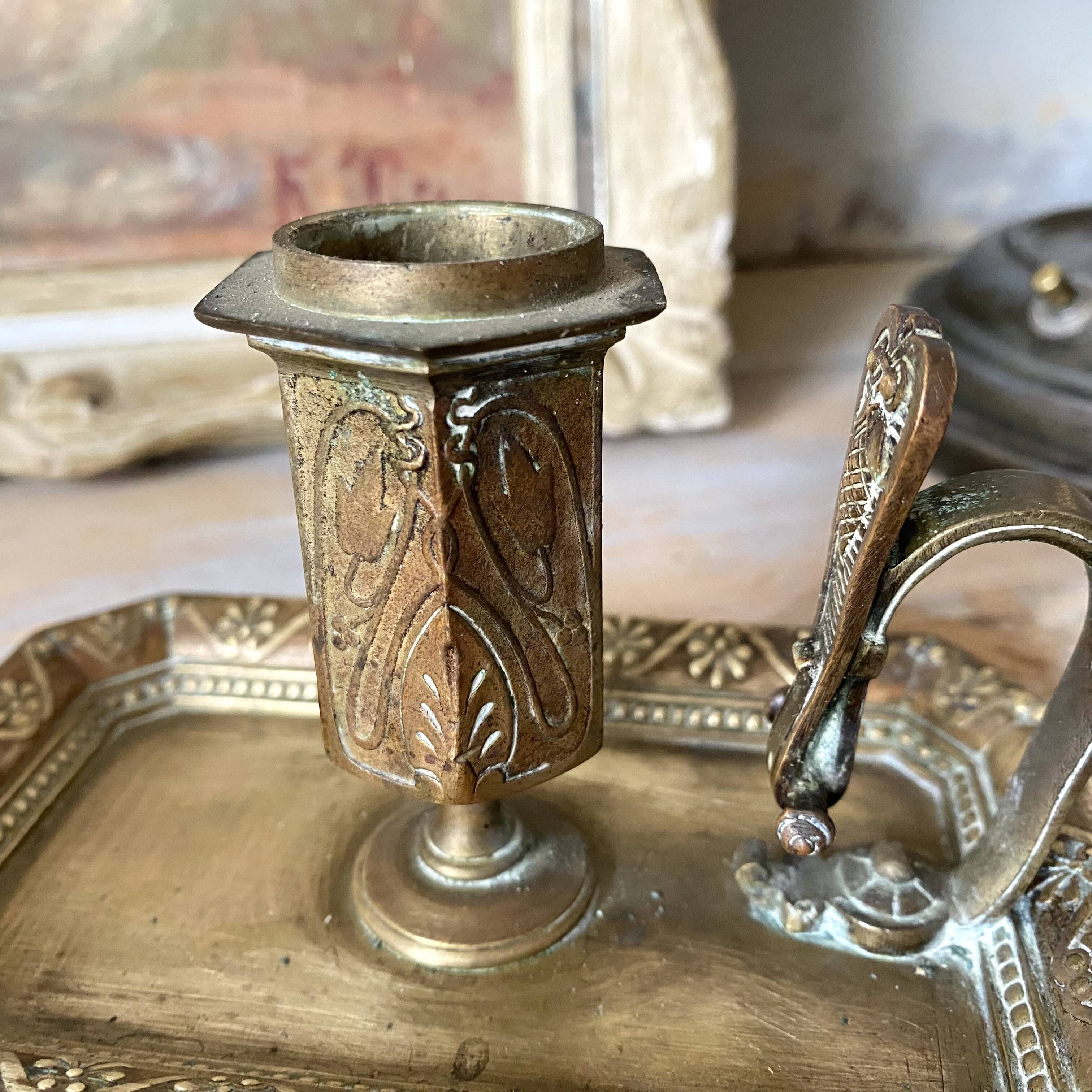 Antique brass thumb candle holder