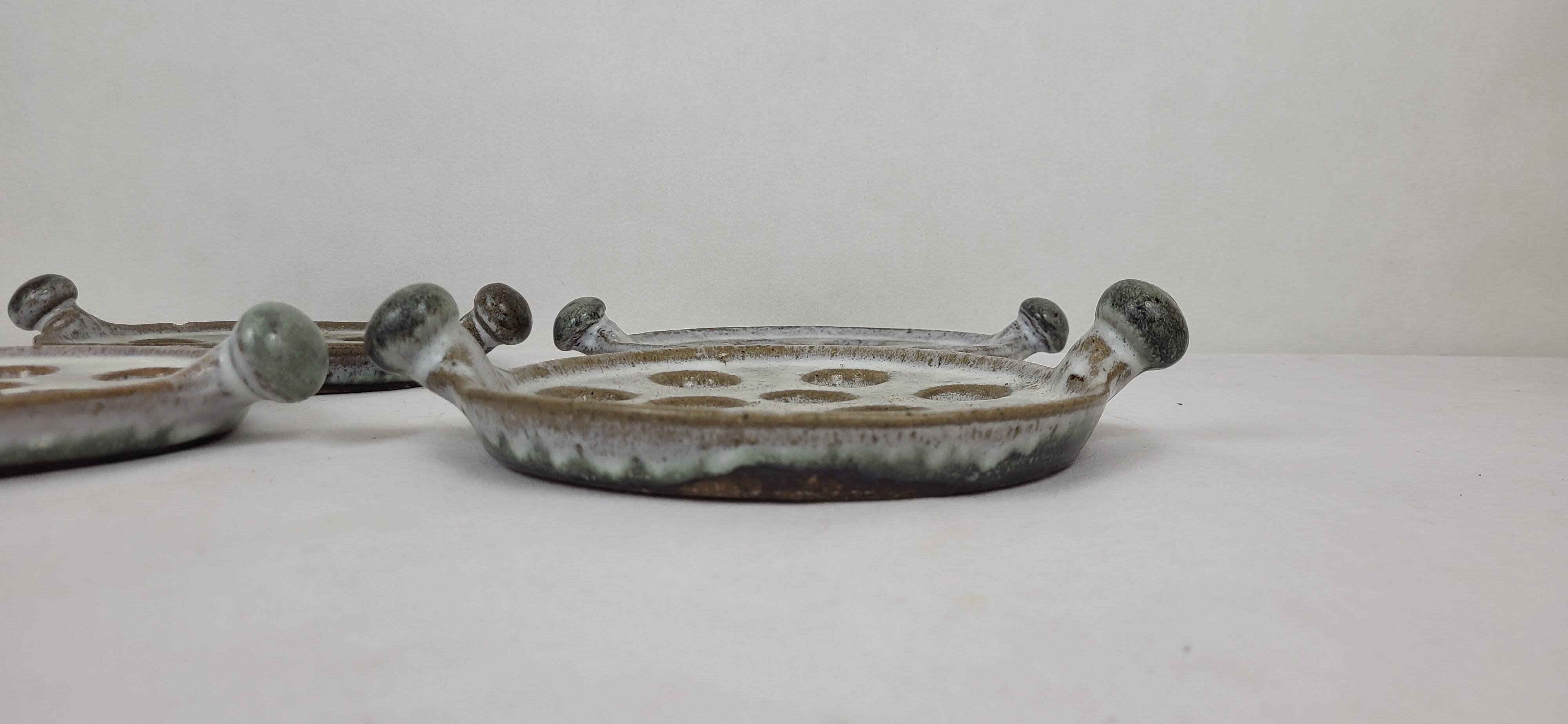 4 stoneware snail plates