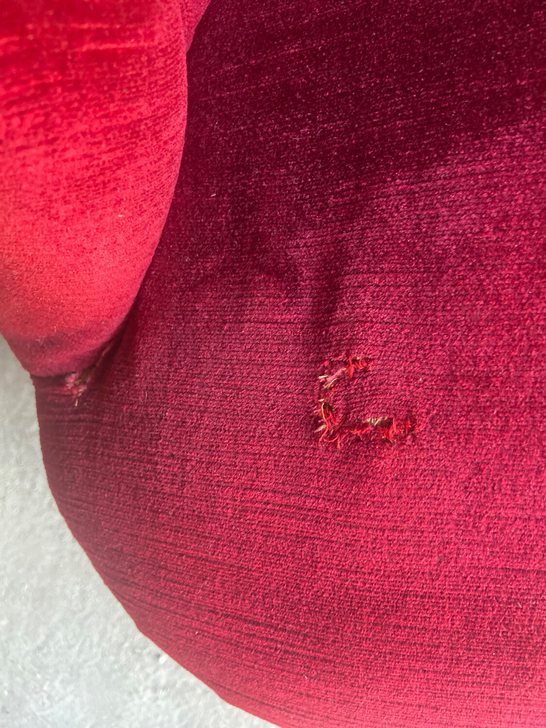 Small old Napoleon III toad sofa in red velvet