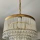Waterfall chandelier in brass and tassels from the 60s and 70s