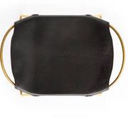 Pair of backless stools, black with brass trim.