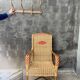Vintage braided rattan armchair