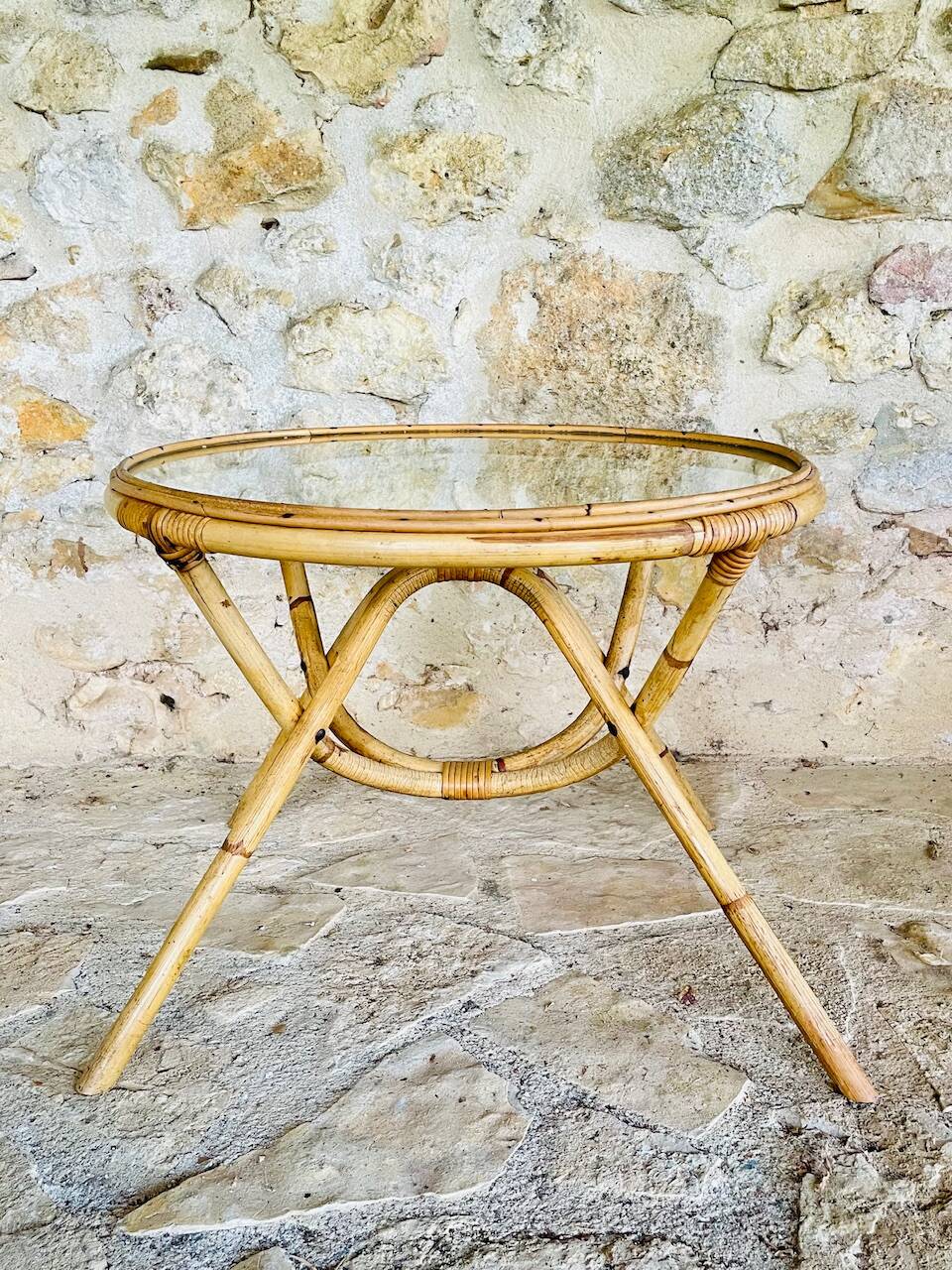 Round bamboo and rattan coffee table with glass top, circa 1960s