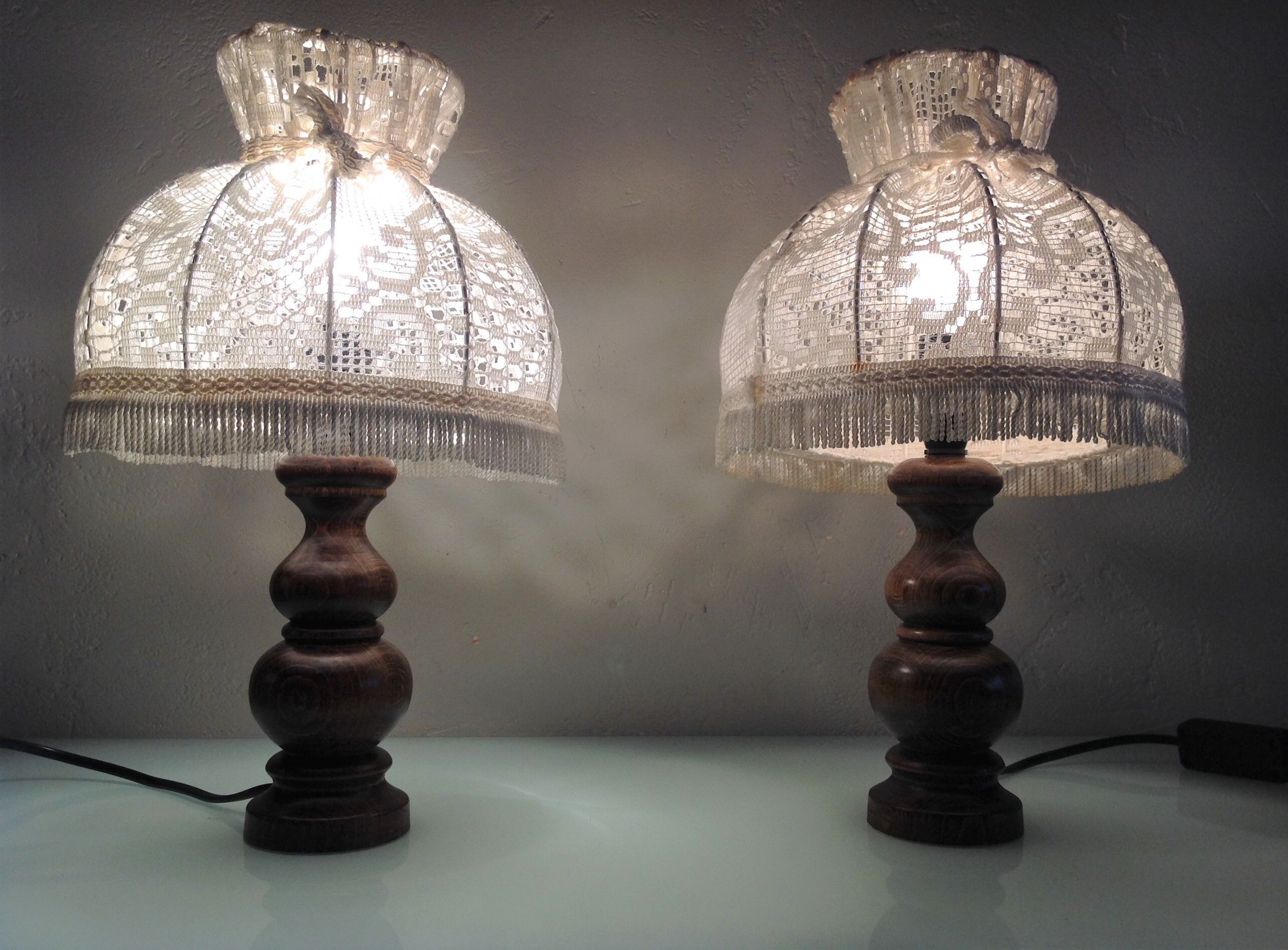 Pair of turned wooden bedside lamps and lace/vintage lampshade 60s-70s