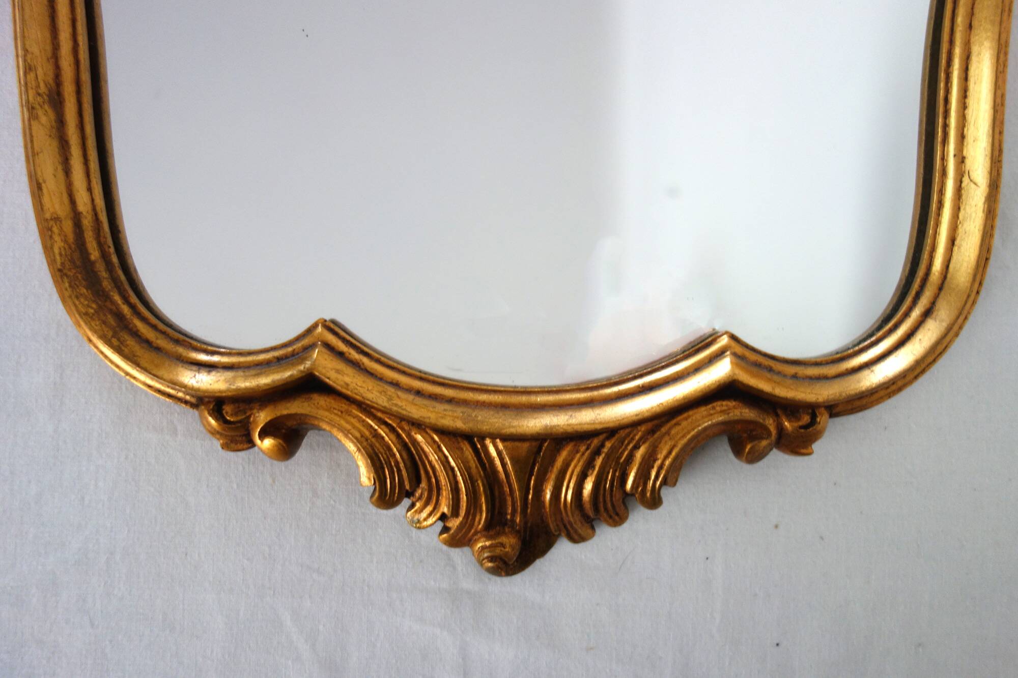 Vintage rocaille or shell gold mirror