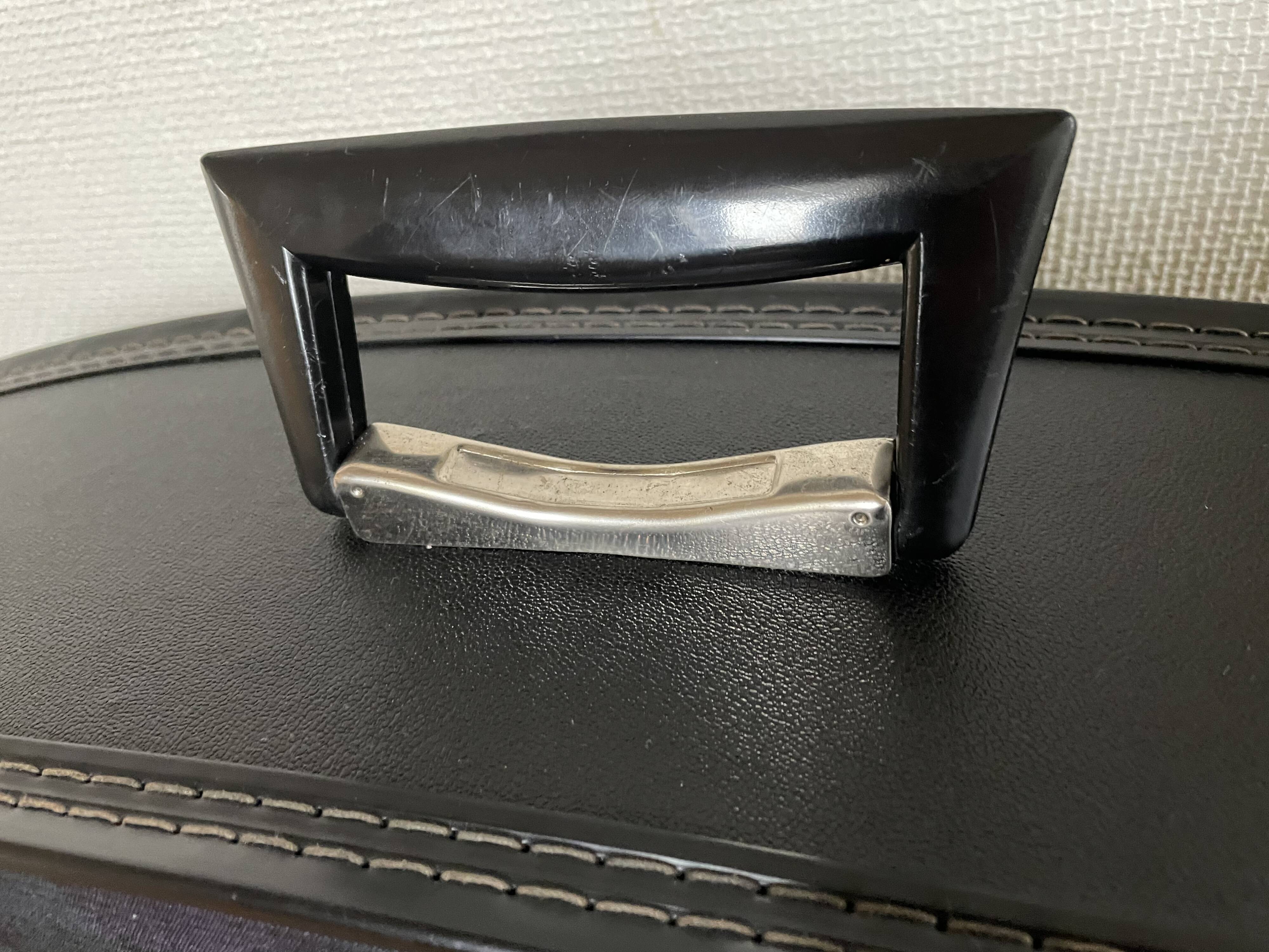 Tartan check suitcase