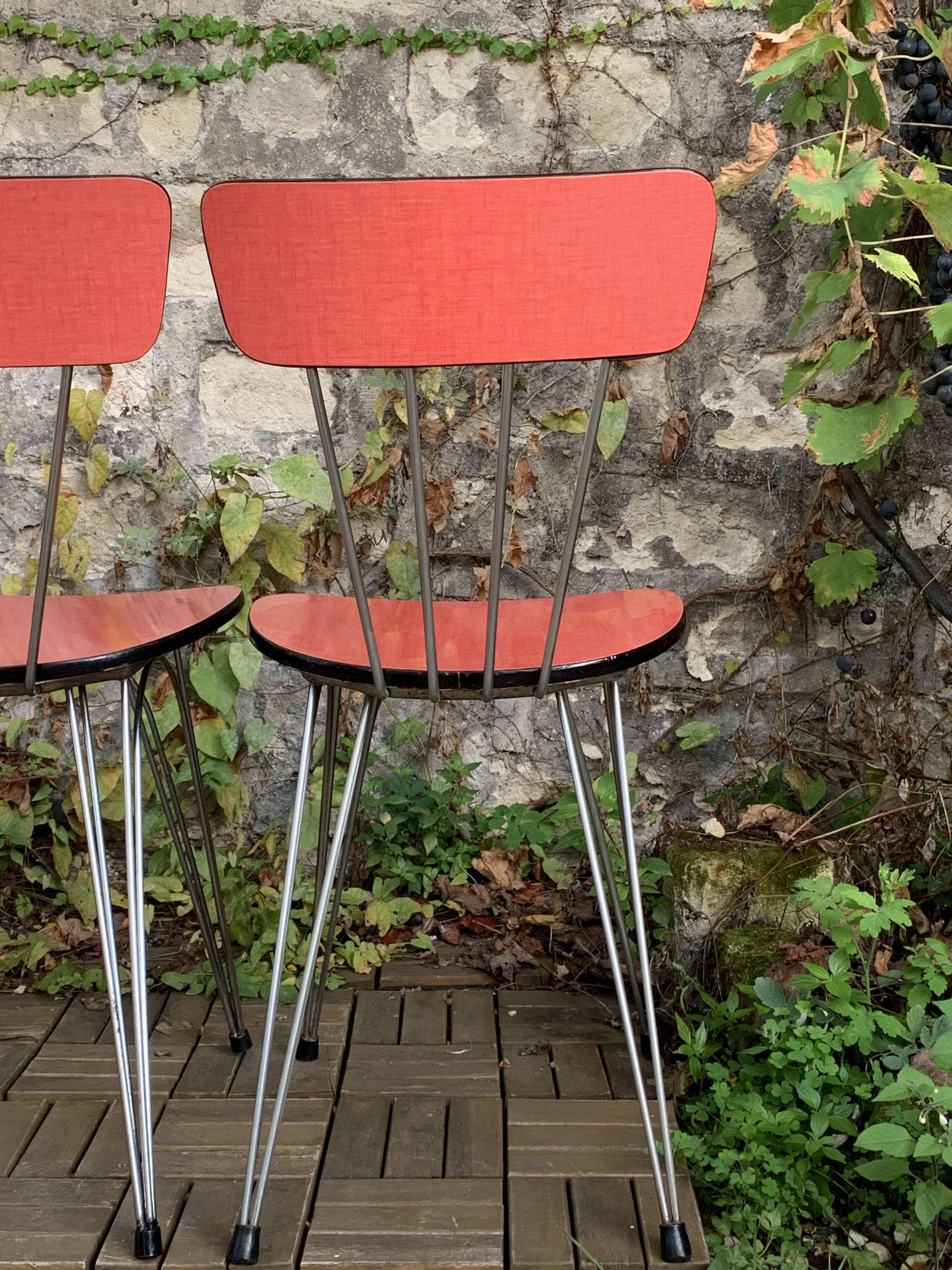 4 red Formica chairs with Eiffel legs, 1950s