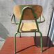 Former green metal child chair
