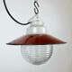 Industrial porcelain red enamel pendant light with ribbed clear glass, 1970s