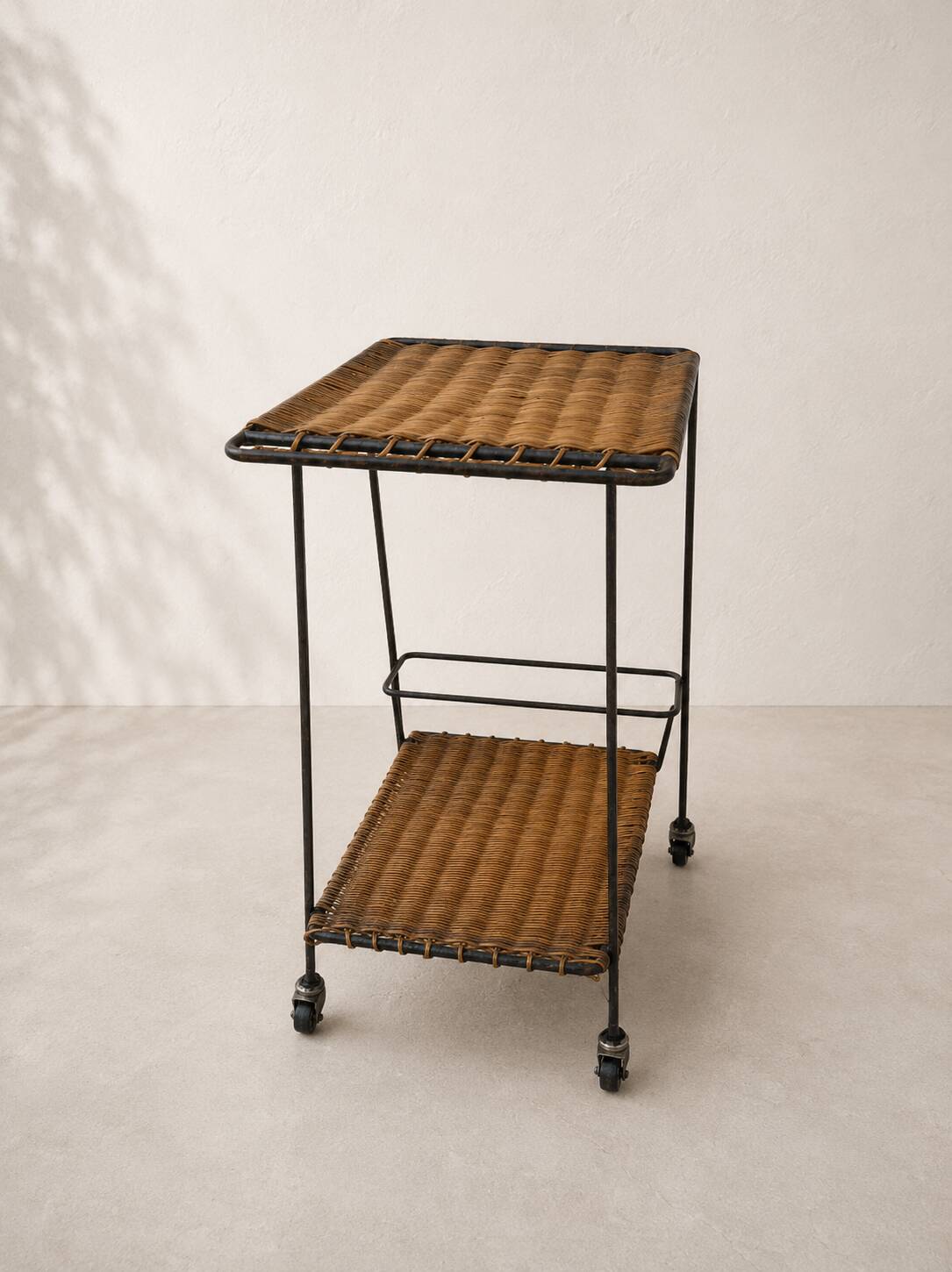Vintage rolling dessert trolley in rattan and black metal – 1950s/60s