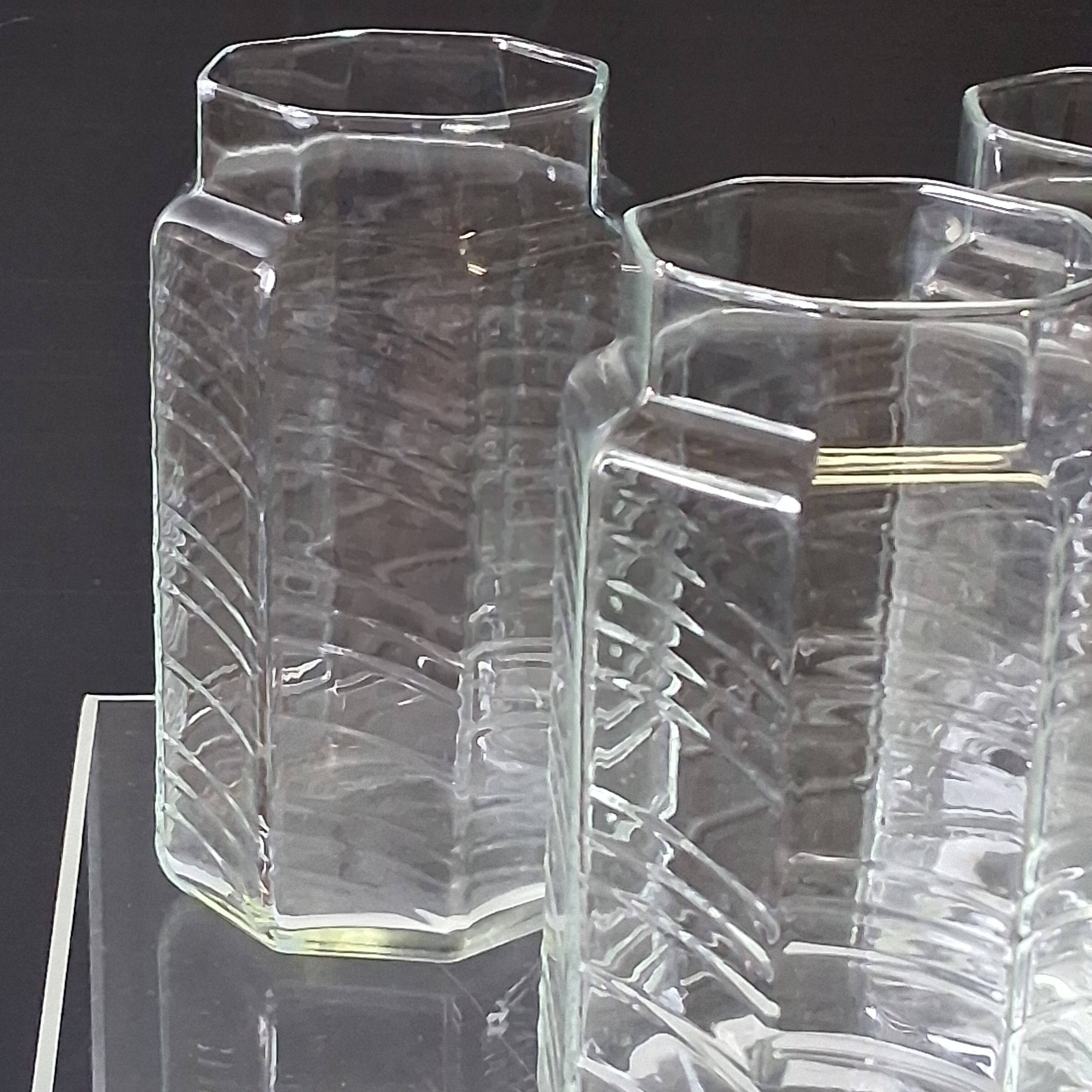 Set of 3 glass jars with old transparent lids in very good condition.