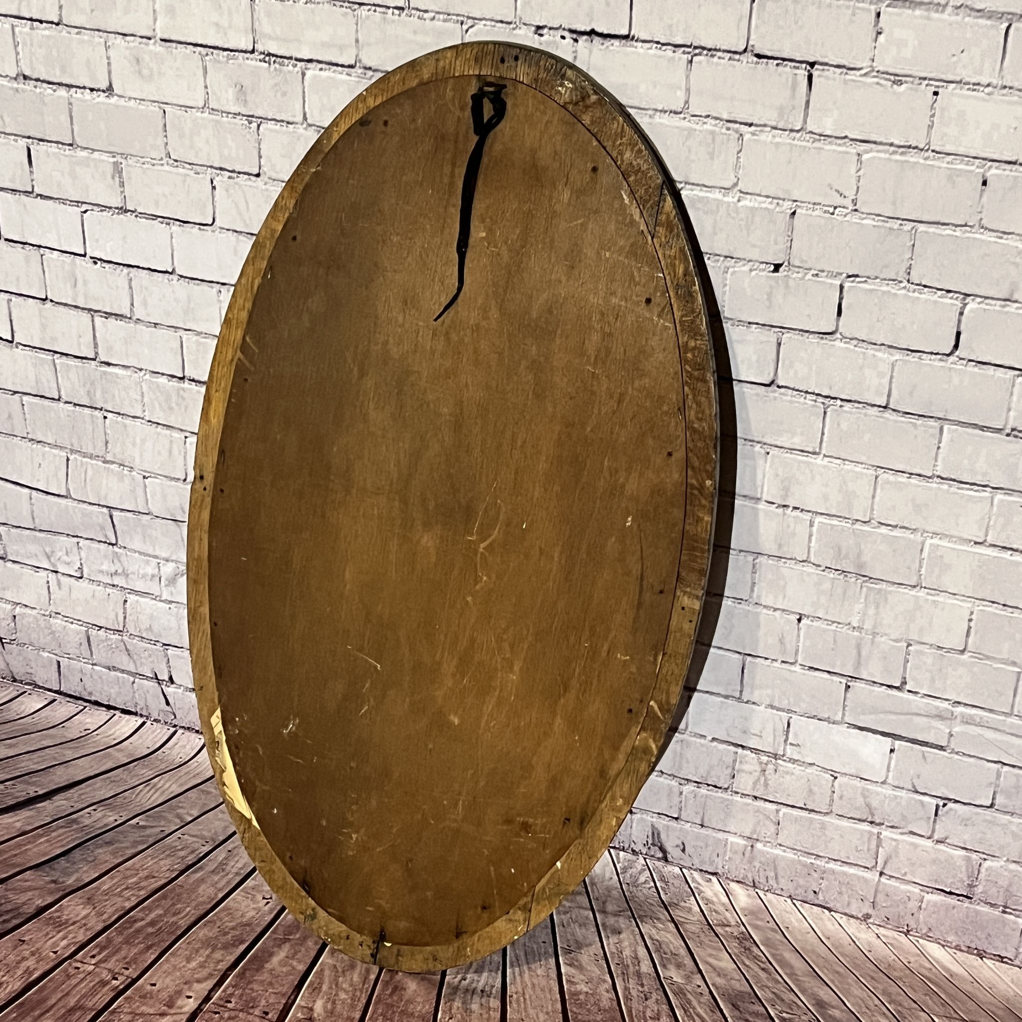 Oval beveled wooden mirror, 93x54 cm