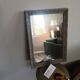 Antique mirror in carved, painted and patinated wood
