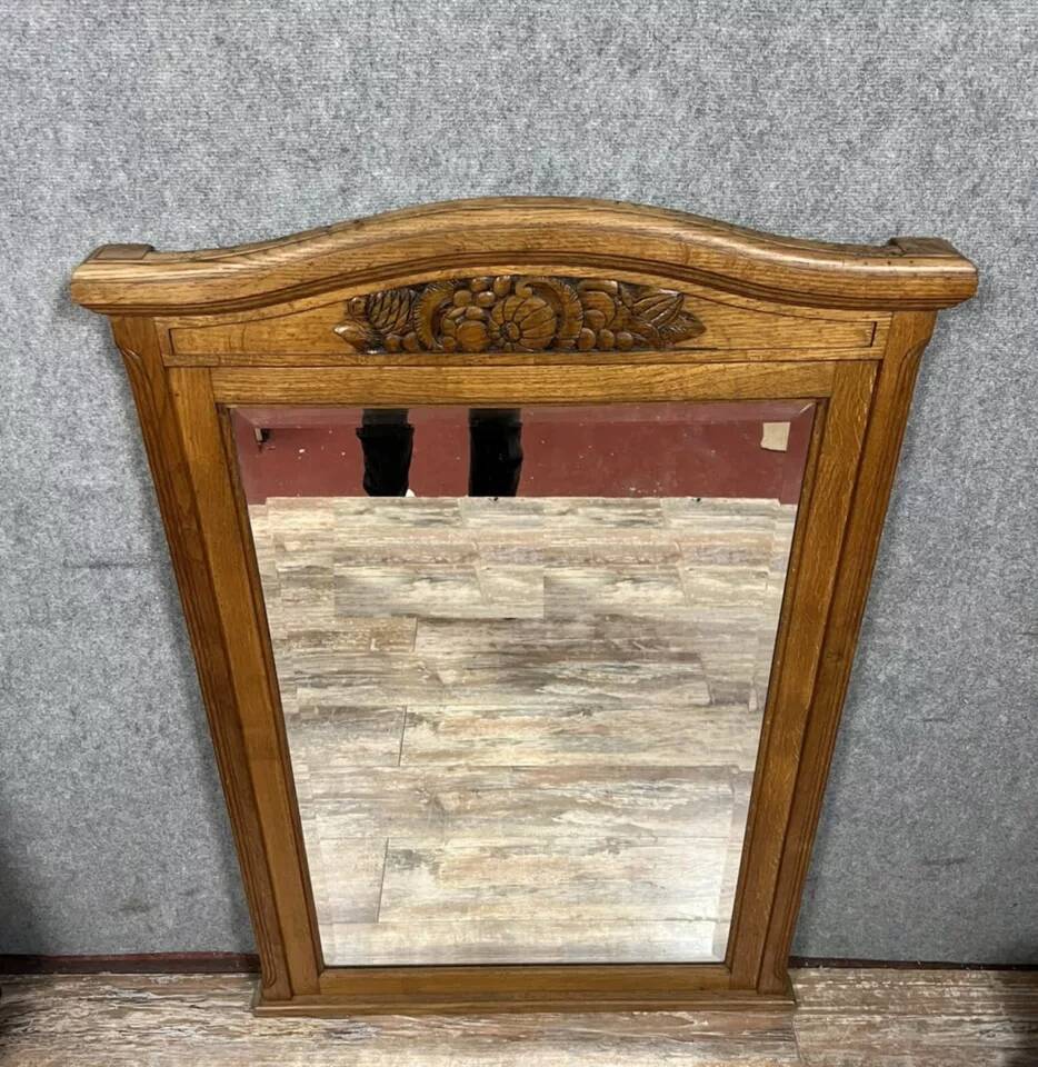 Large Art Deco period mirror in carved oak circa 1930