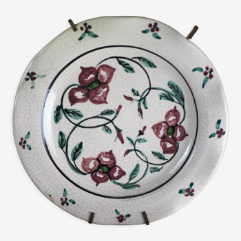 Meyssac plate decorated with flowers on cracked background early twentieth century and its support